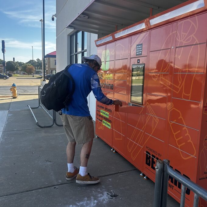 A neighbor getting help at a BeSeen machine